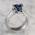 Modern Juicy Liqueur Engagement Ring with Diamonds Channels and Accents